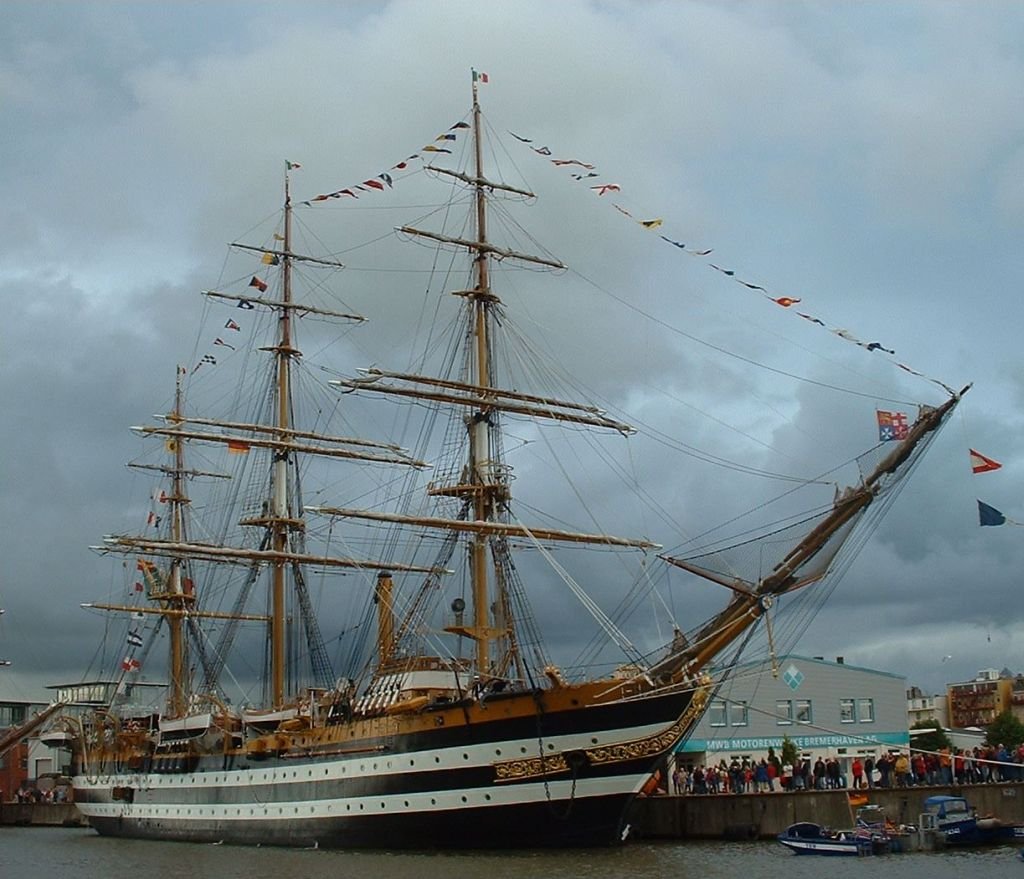 The training ship Amerigo Vespucci in side profile dressed with signal flags
