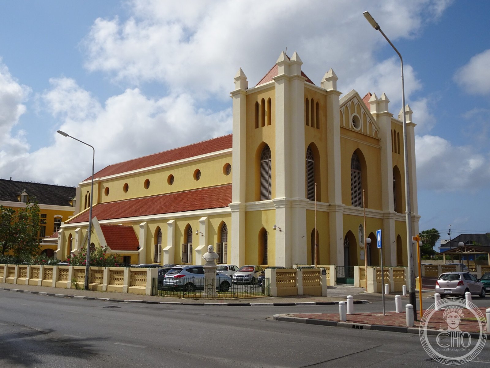 Queen of the Most Holy Rosary Cathedral in the Pietermaai district of Willemstad, Curaçao, a yellow Gothic Revival church facade