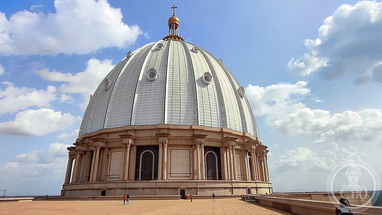 The Basilica of Our Lady of Peace in Yamoussoukro, Ivory Coast, modeled on St. Peter's Basilica in Rome with a dome twice as wide, built in the 1980s and now among the largest and least attended churches in the world