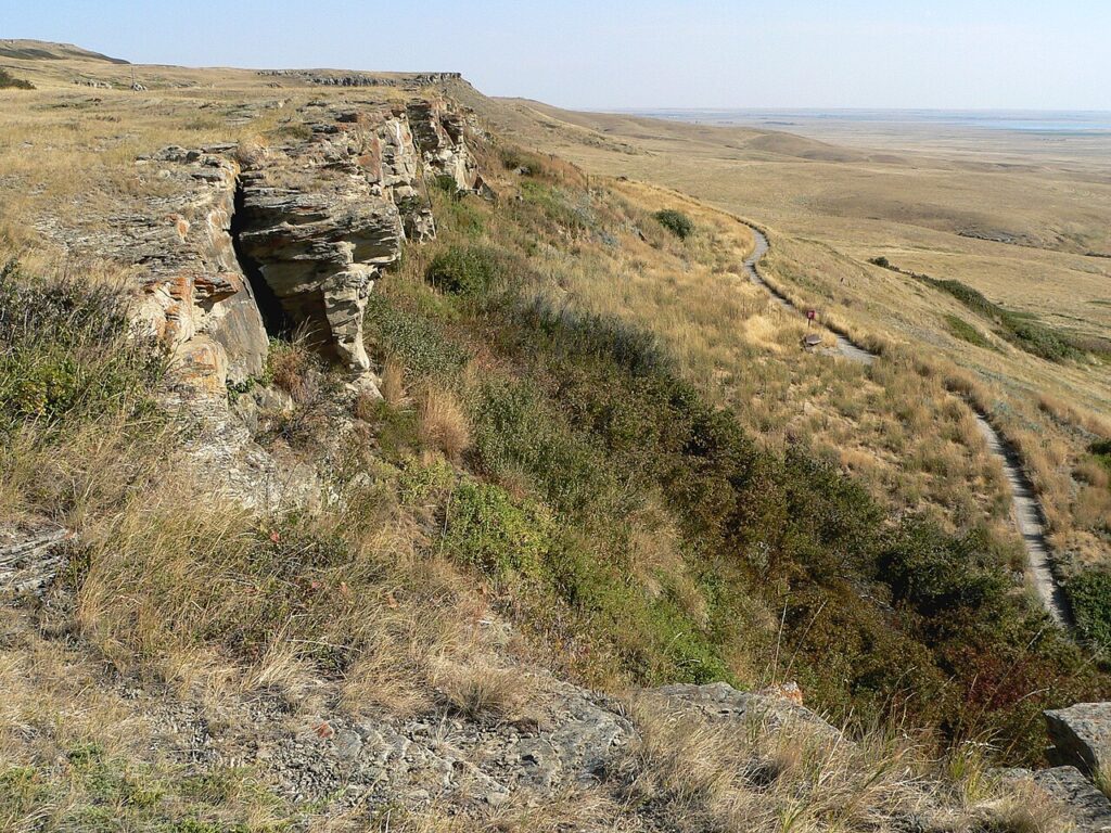 UNESCO World Heritage Sites Near Head-Smashed-In Buffalo Jump: 5,800 Years of Blackfoot Bison Hunting, 12 Metres of Compressed Bone and the Legend Behind the Name