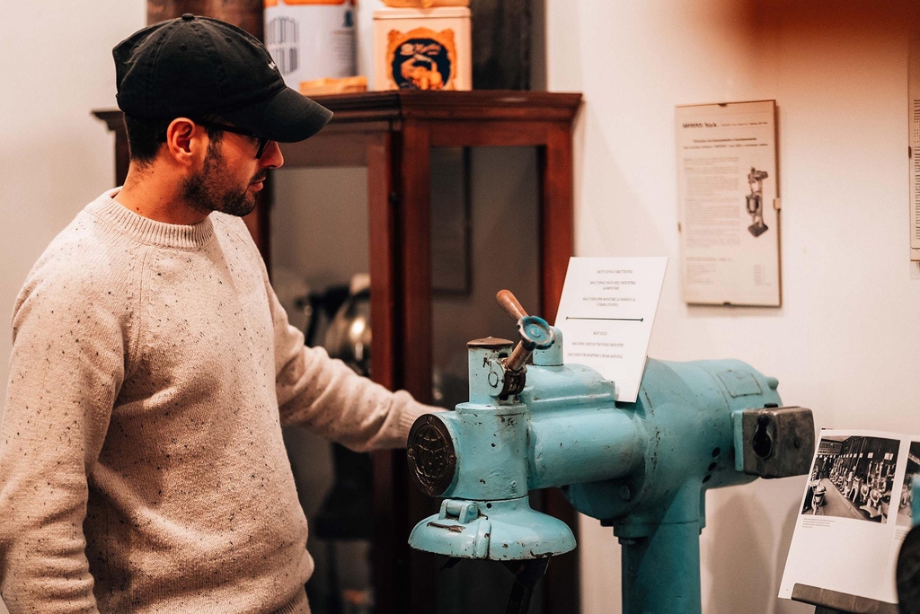 Omar Cirulli, founder of Artefact Frascati, beside the transmission line's control valve