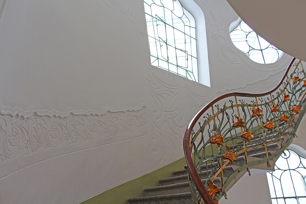 The flowing green-and-lilac Art Nouveau façade of the Reök Palace, Szeged