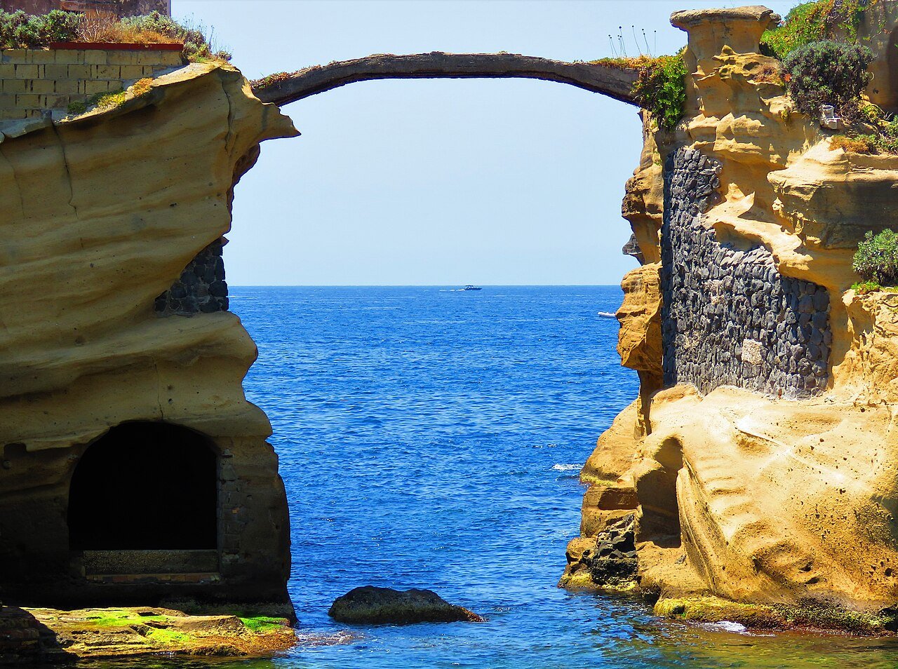 The natural arch between the two islets of the Gaiola off Posillipo, in the Gulf of Naples, on the Naples–Capri crossing