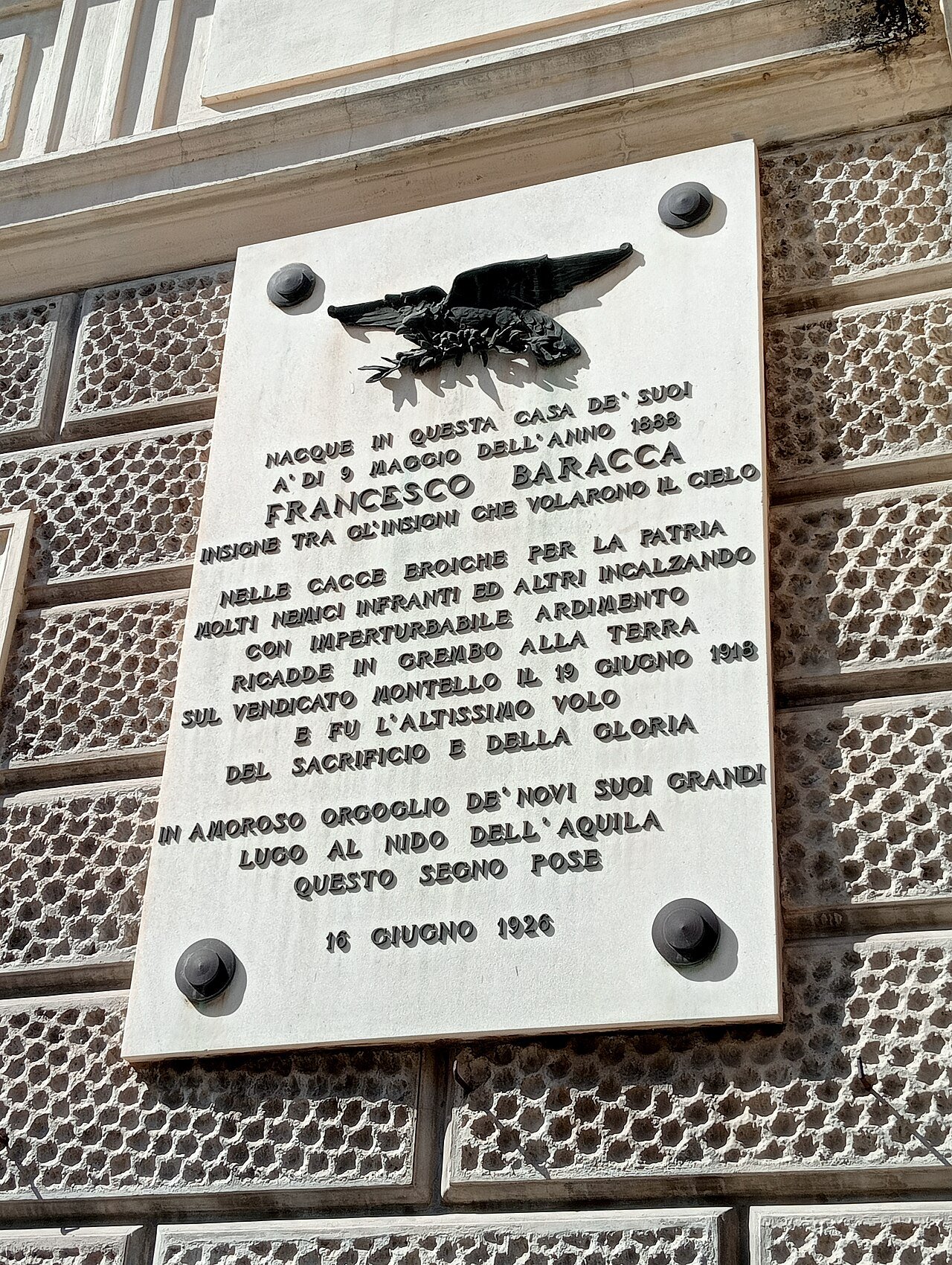 The 1926 memorial plaque on the facade of the Baracca birthplace in Lugo