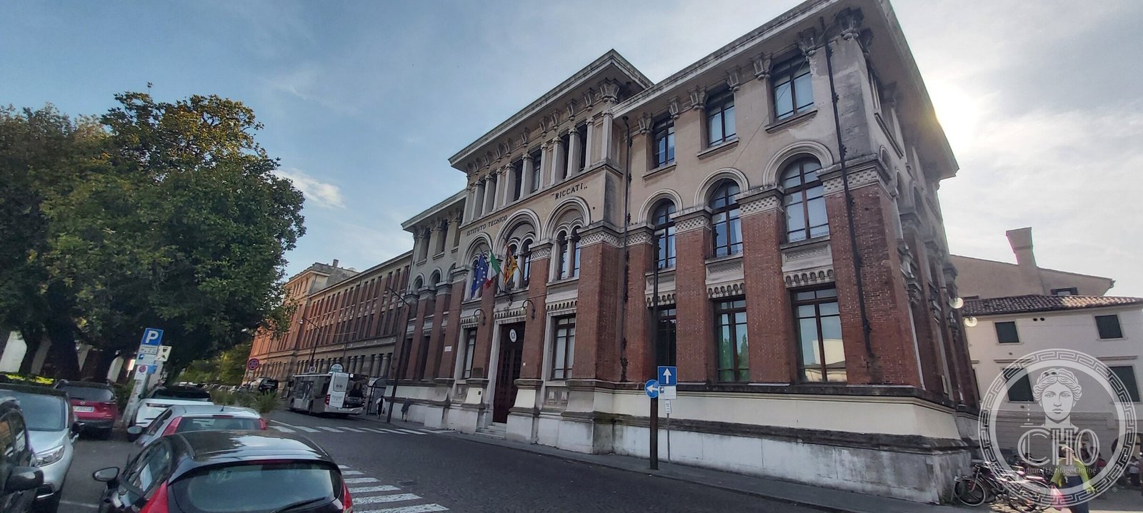 The Istituto Tecnico Riccati in Treviso: a long brick and stone school building with an arcaded upper loggia and the name RICCATI on the frieze