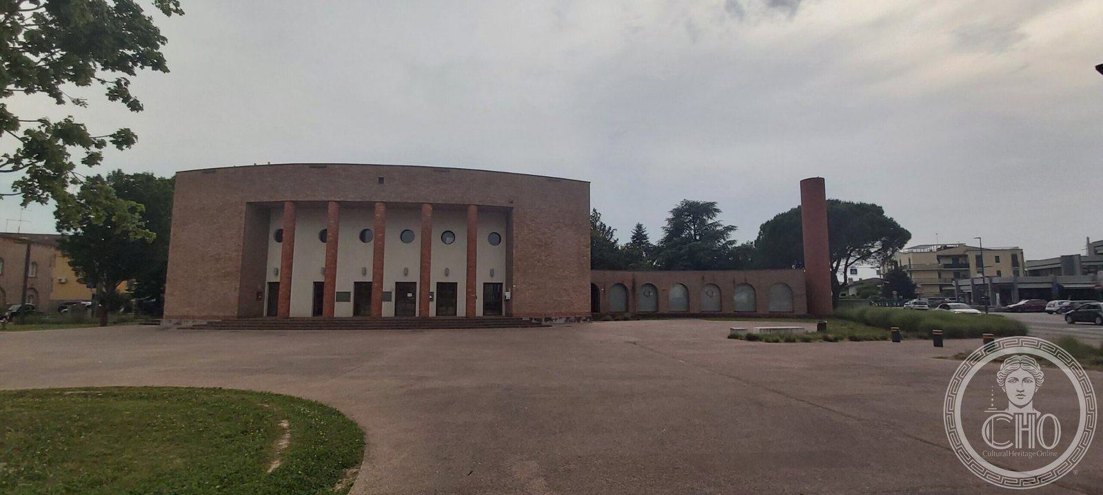 Teatro Quirino De Giorgio Vigonza — the front with the arched market loggia and cylindrical brick tower