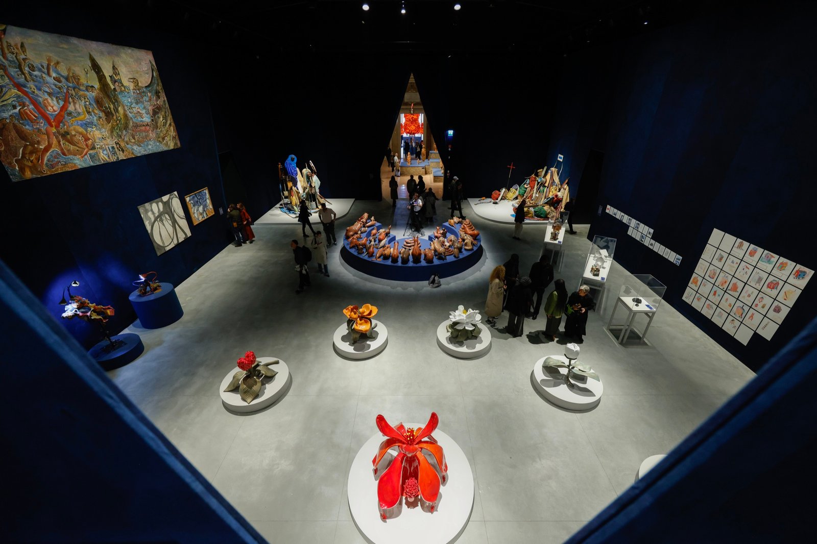 Exhibition room with sculptures and paintings at In Minor Keys, La Biennale di Venezia
