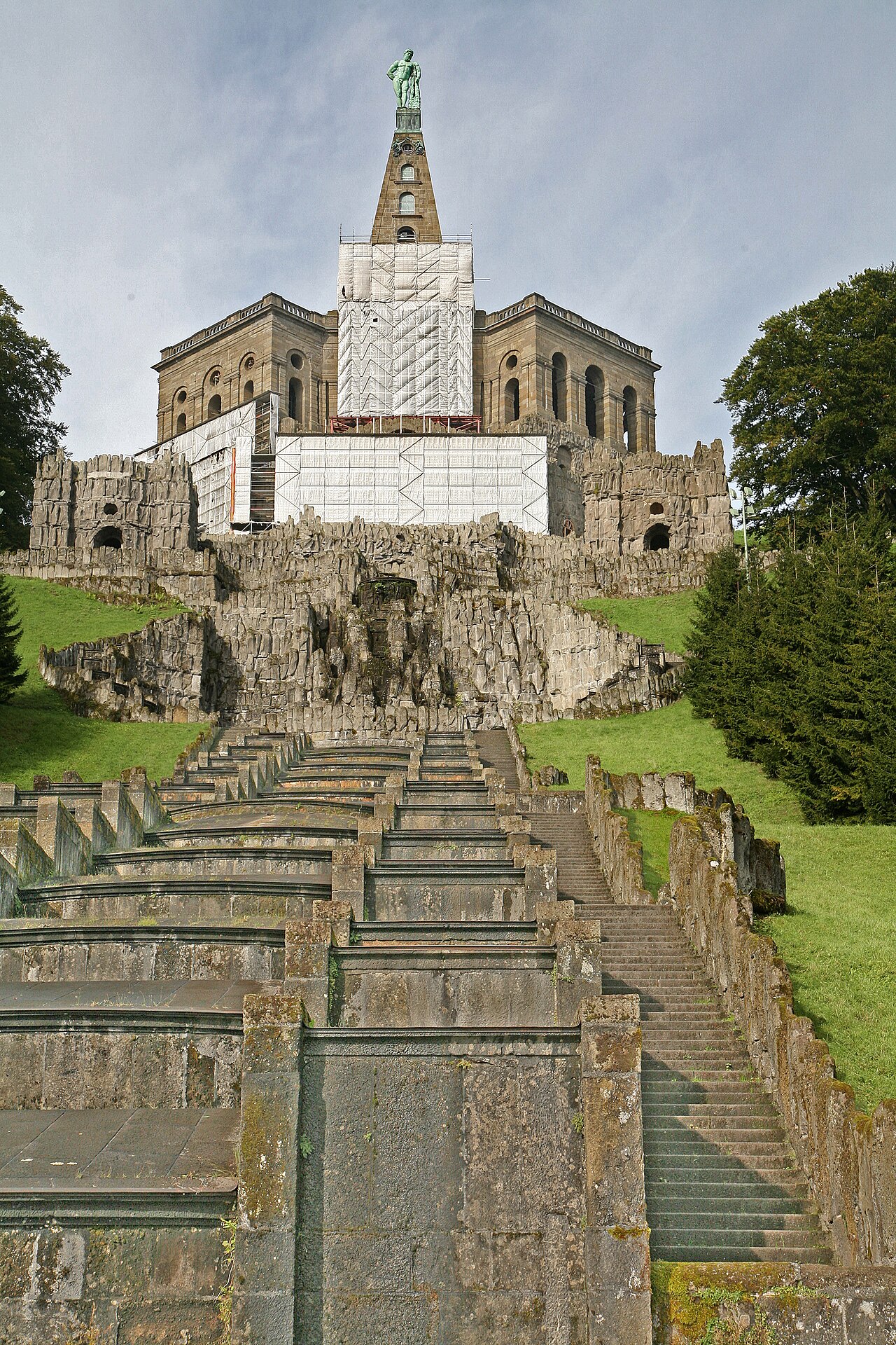 The Hercules monument atop the Octagon with the water cascades descending the hillside of Bergpark Wilhelmshöhe, Kassel, Germany