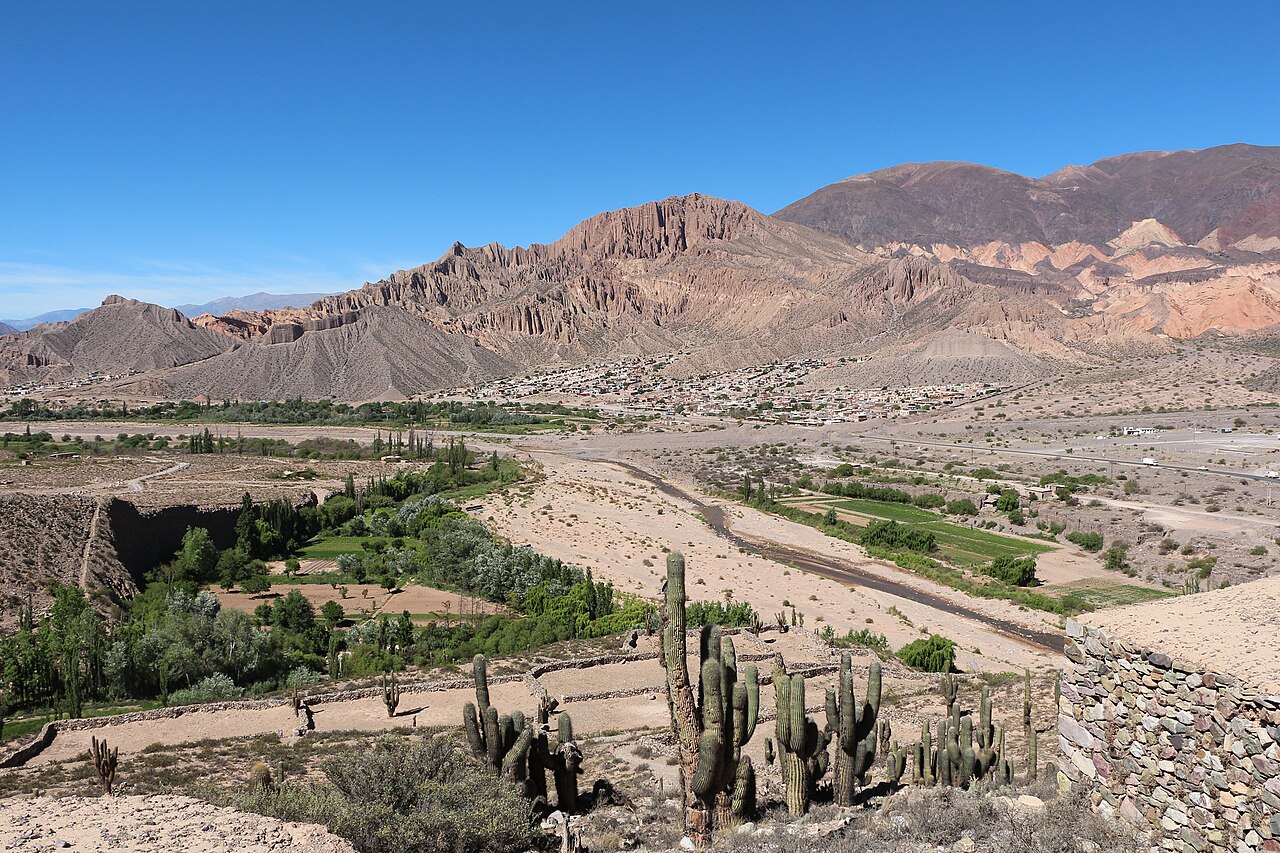 Quebrada de Humahuaca canyon landscape with ochre and red rock formations in Jujuy Province, Argentina