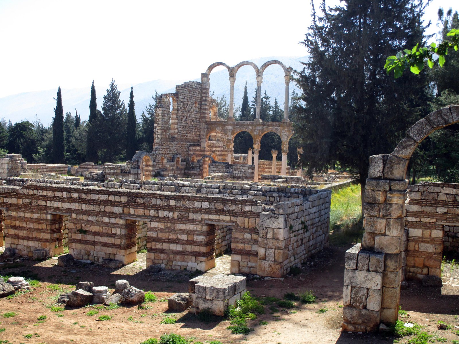 Stone archways and columns along an excavated Umayyad street at Anjar in the Bekaa Valley