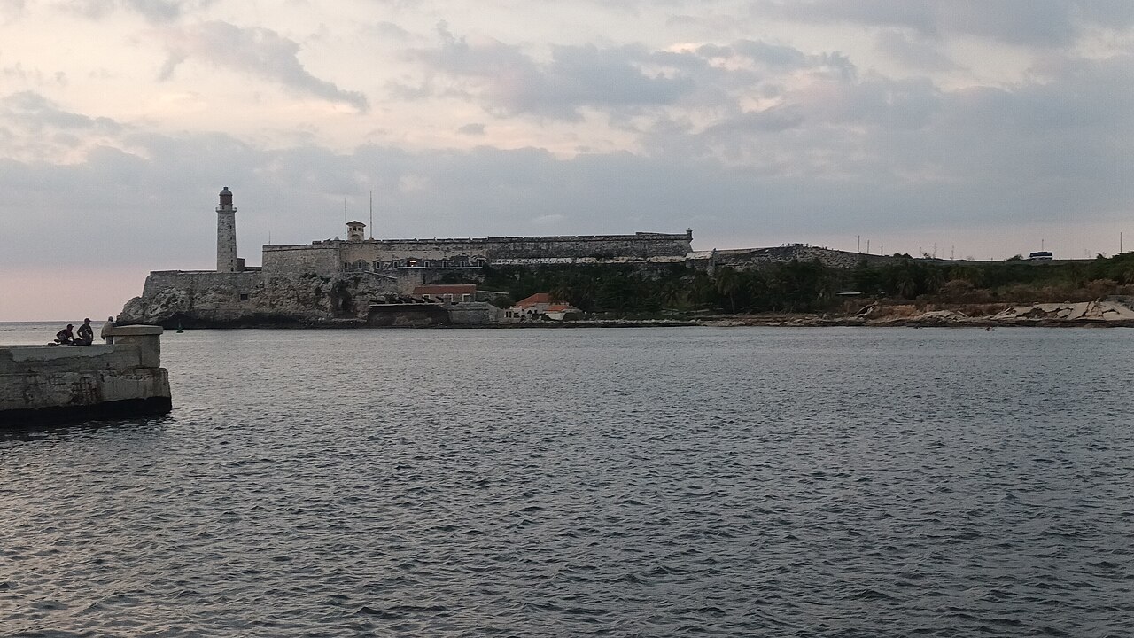 Havana Bay at dusk with the city skyline and fortress walls visible