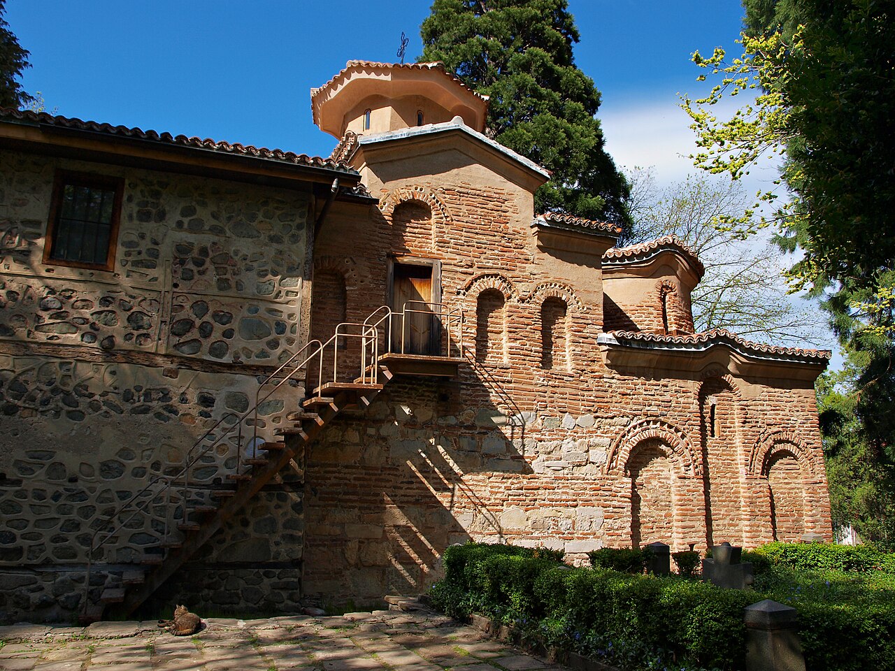 Boyana Church exterior near Sofia, Bulgaria — a small medieval Orthodox church with three building phases visible