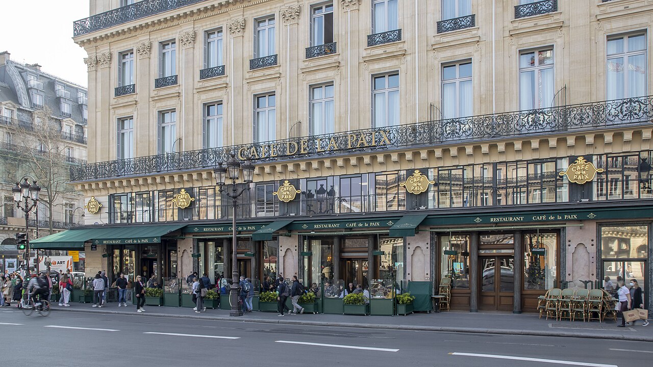 The terrace and facade of the Café de la Paix on the Place de l'Opéra, Paris