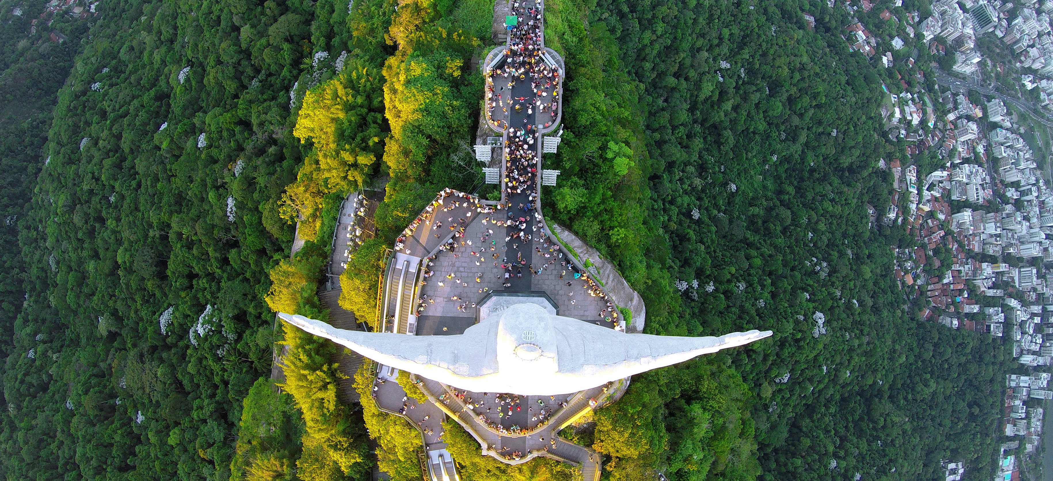 Christ the Redeemer statue on Corcovado seen from above with Rio de Janeiro spread below