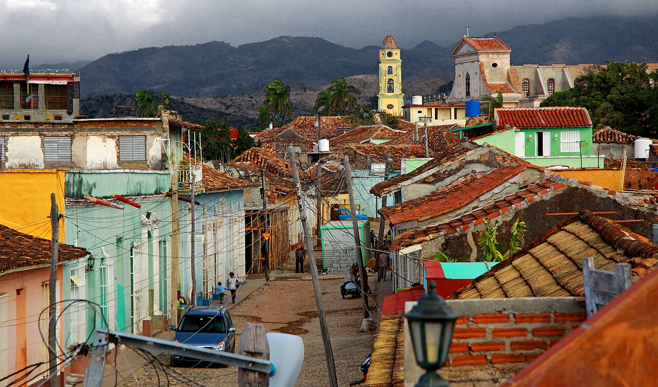 Trinidad Cuba colonial rooftops and church towers seen from above at sunset