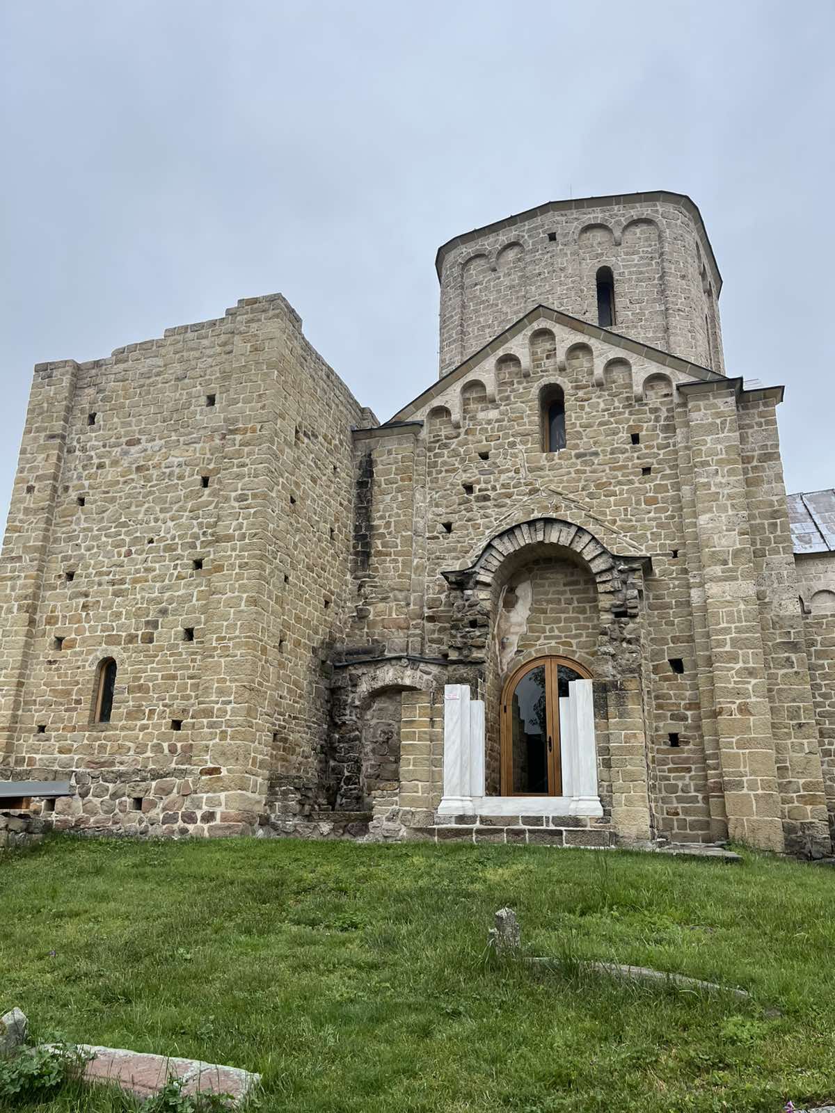 Stone ruins of Đurđevi Stupovi monastery with a surviving tower rising above the hillside