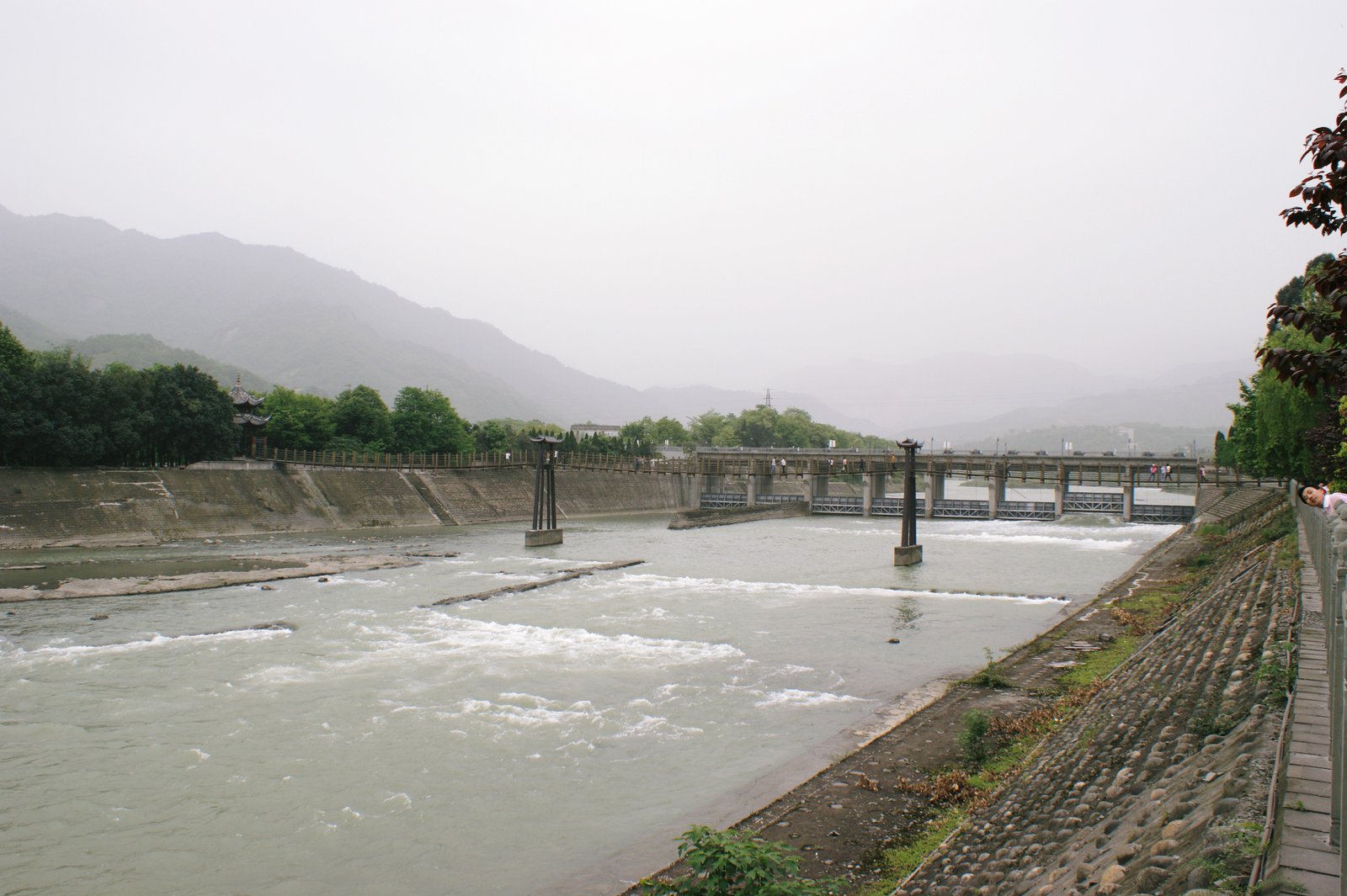 Fish Mouth Levee at Dujiangyan Irrigation System with the Min River in full flow, Sichuan, China