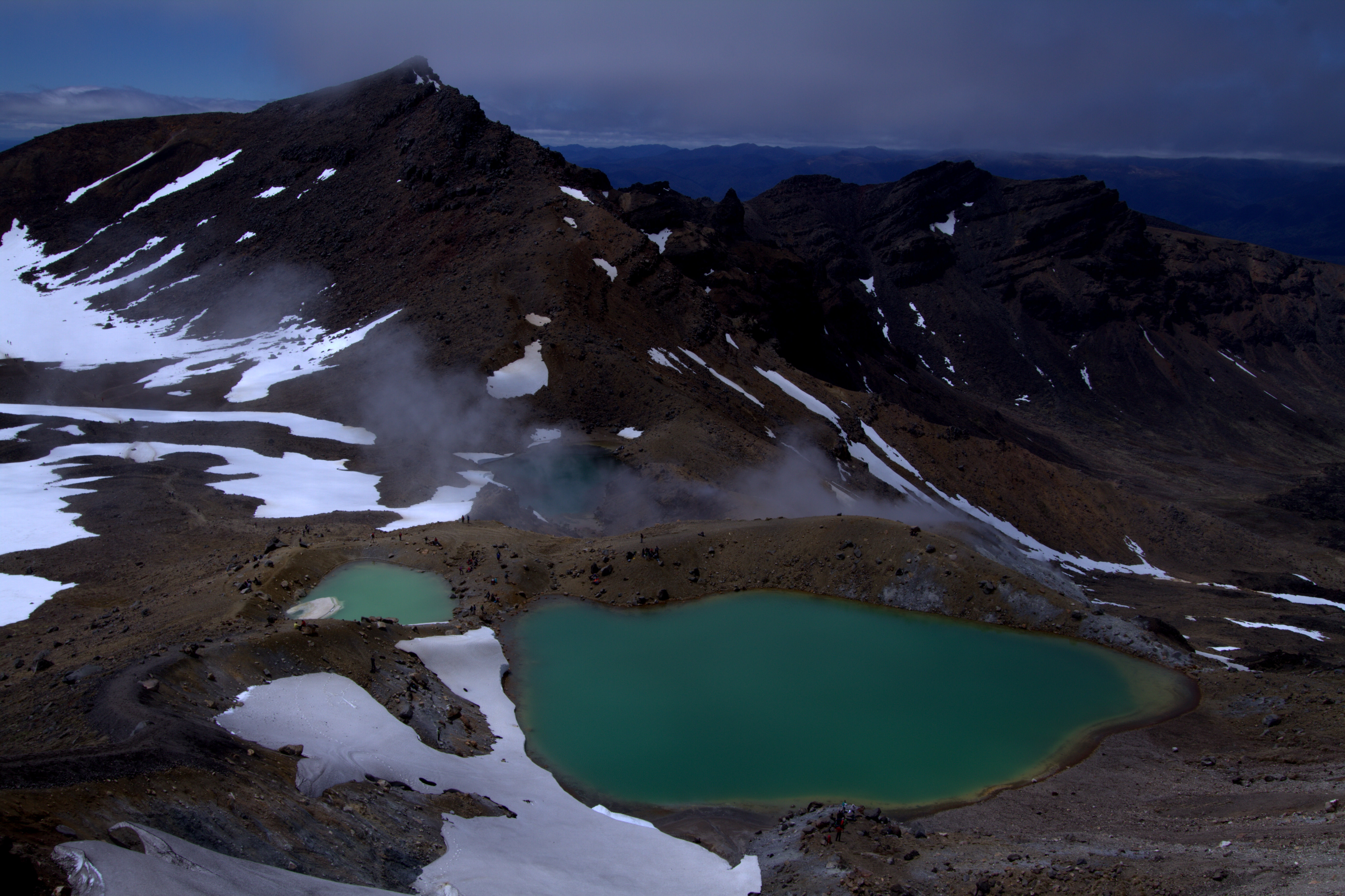 Vivid turquoise Emerald Lakes in volcanic crater landscape on Tongariro Alpine Crossing