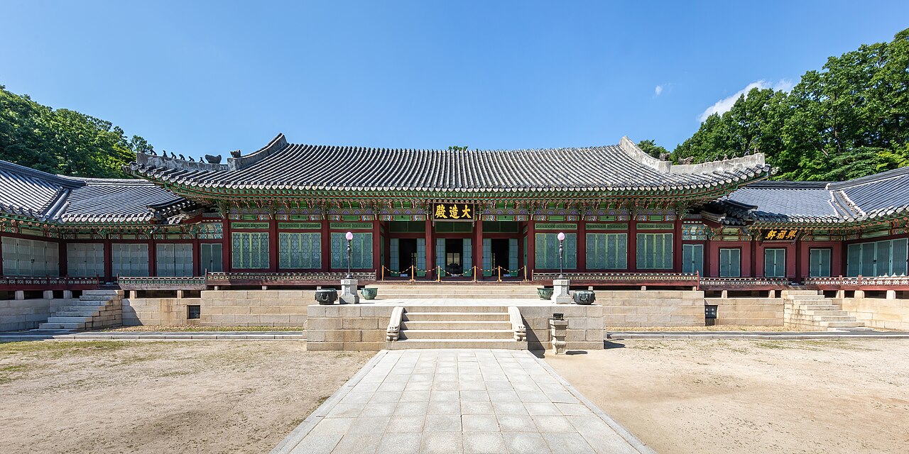 Exterior front view of Daejojeon Hall of Changdeokgung Palace with blue sky in Seoul