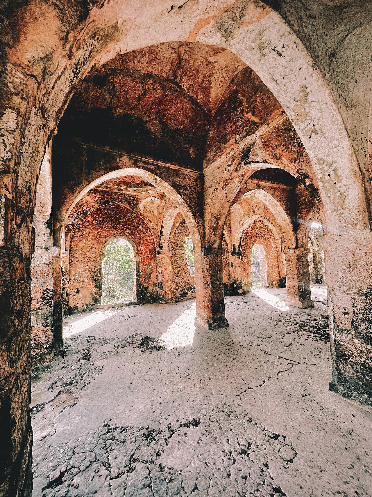 Interior of the Great Mosque of Kilwa Kisiwani showing coral-stone columns and vaulted ceilings, Tanzania