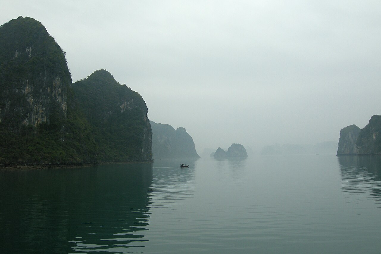 The emerald waters of Ha Long Bay, Vietnam, with hundreds of limestone karst islands rising vertically from the Gulf of Tonkin — UNESCO World Heritage inscribed in 1994, one of the most recognisable natural landscapes in Southeast Asia