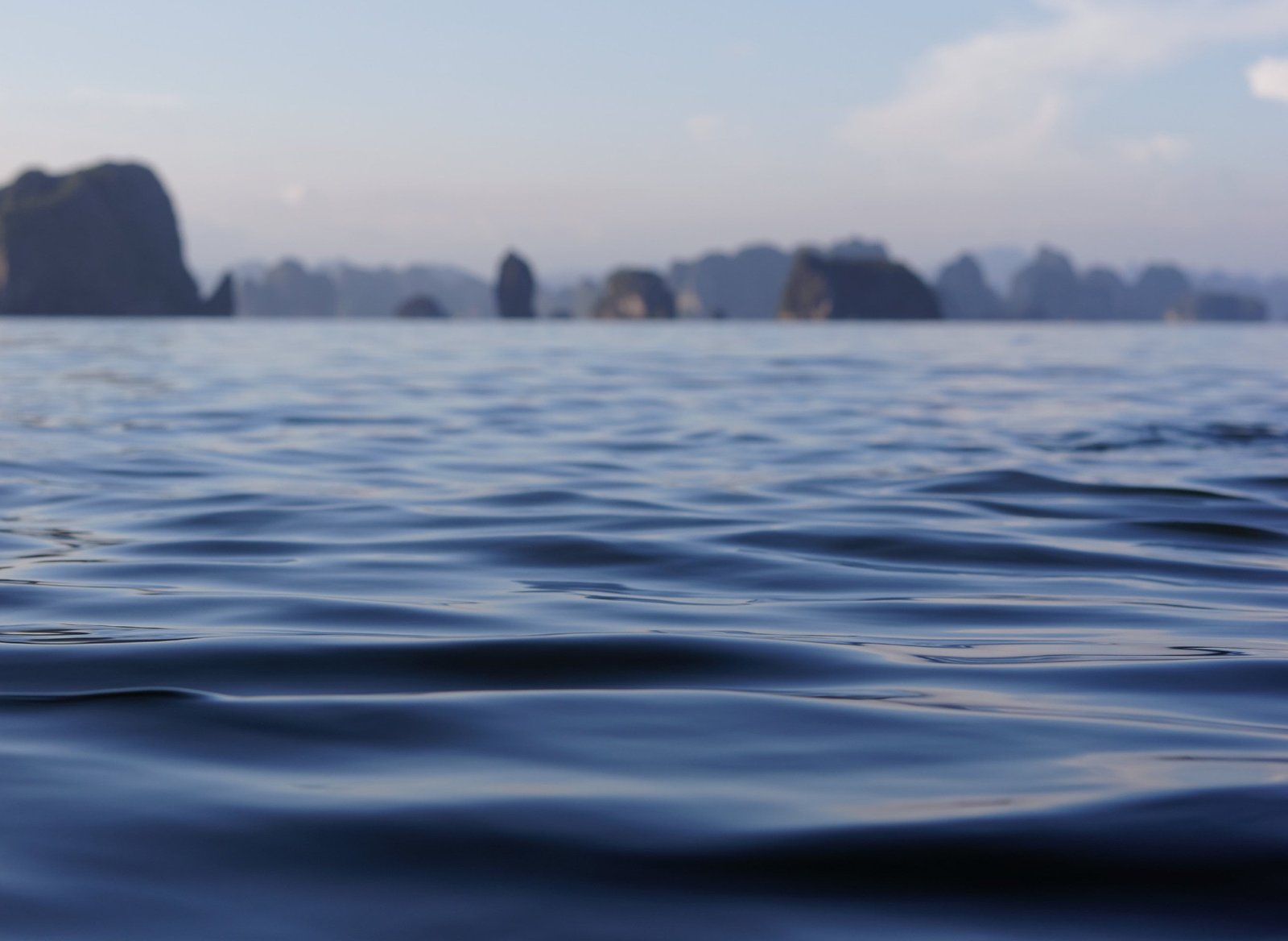 Ha Long Bay Vietnam limestone karsts rising from calm water