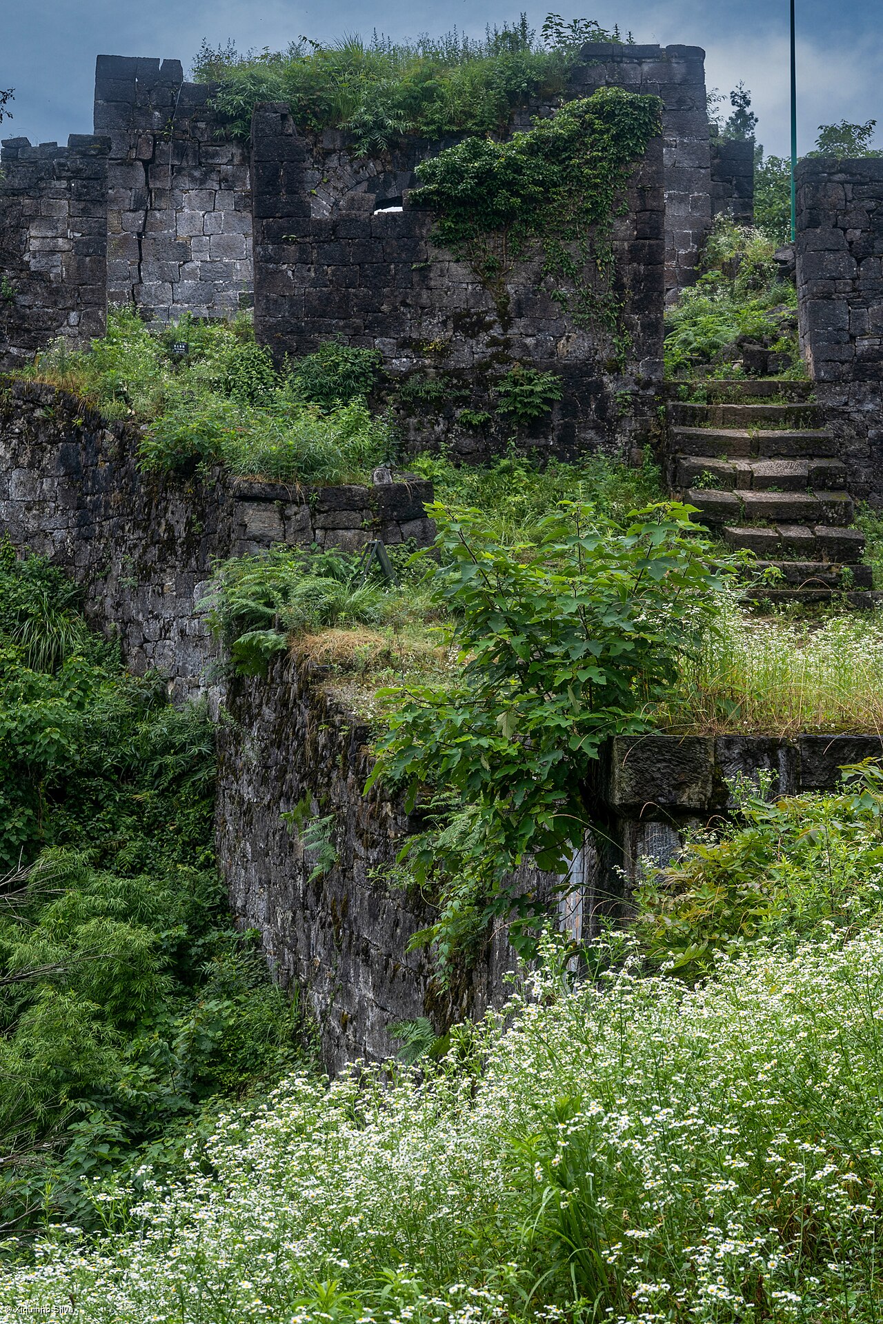 Hailongtun Tusi Fortress stone walls terraced clifftop Zunyi Guizhou China