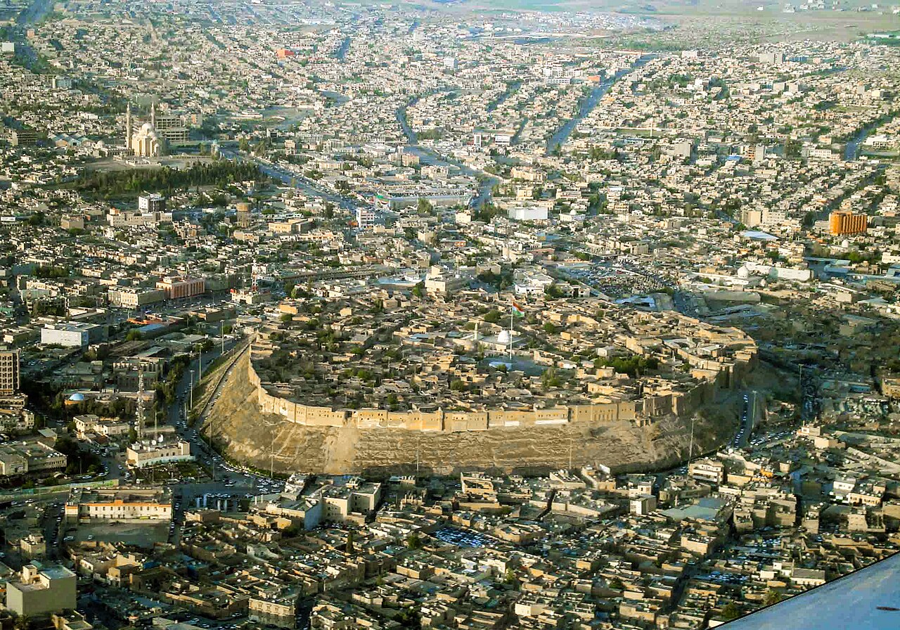 Erbil Citadel rising on its tell mound above the modern city of Erbil in Iraqi Kurdistan