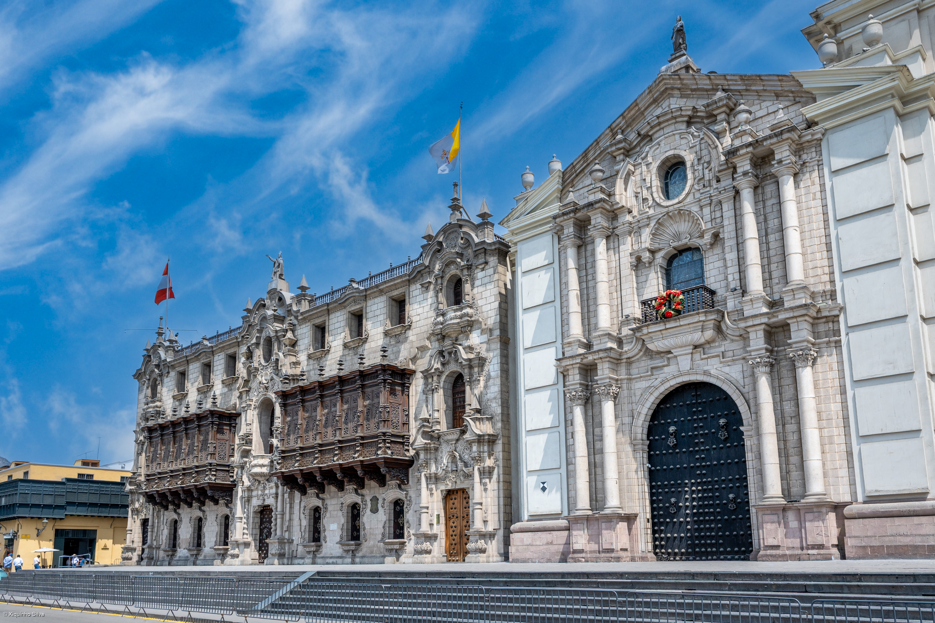 Lima Cathedral and Government Palace façades framing the Plaza Mayor