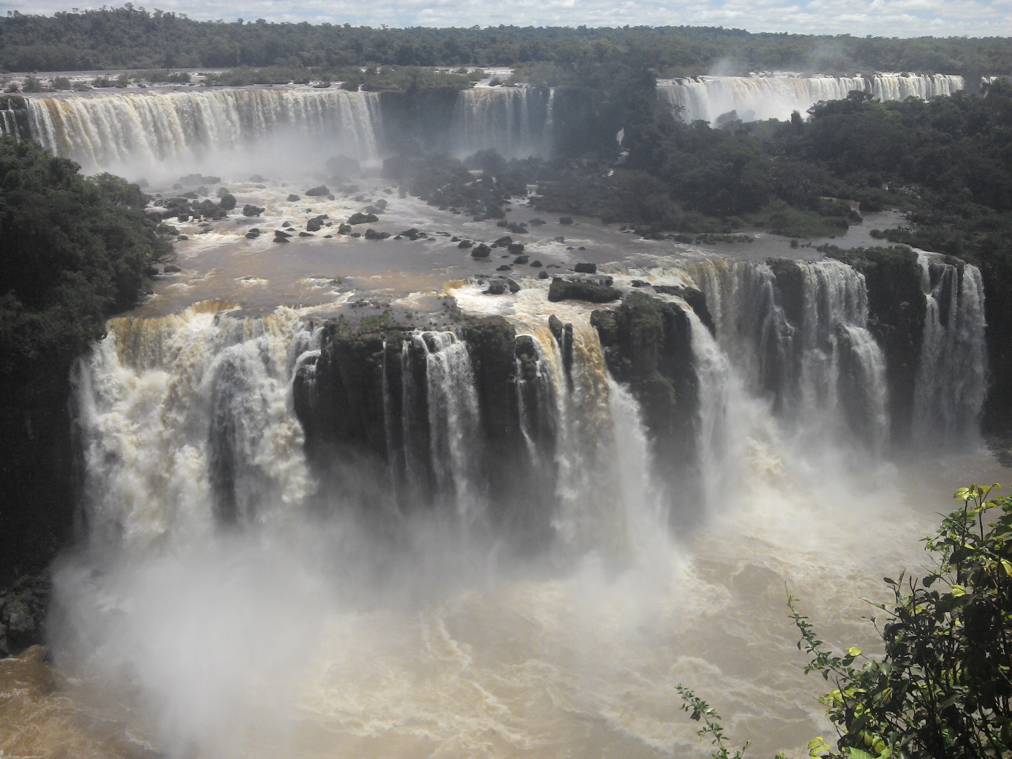 Iguazu Falls wide curtain of waterfalls seen from Argentina side