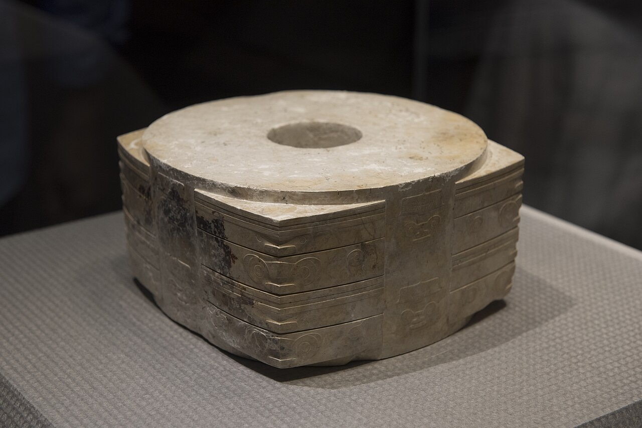 The Jade Cong King — the largest and finest jade cong ritual tube from the Liangzhu culture (c. 3300–2300 BCE), now in the Zhejiang Museum, Hangzhou, showing the characteristic four-quadrant beast-face (taotie) motif carved in relief on the flat sides of the tubular ceremonial jade