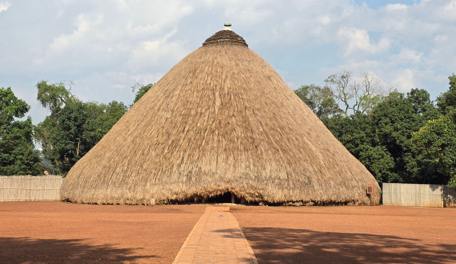 Rebuilt thatch entrance structures of the Kasubi Tombs royal burial site in Kampala