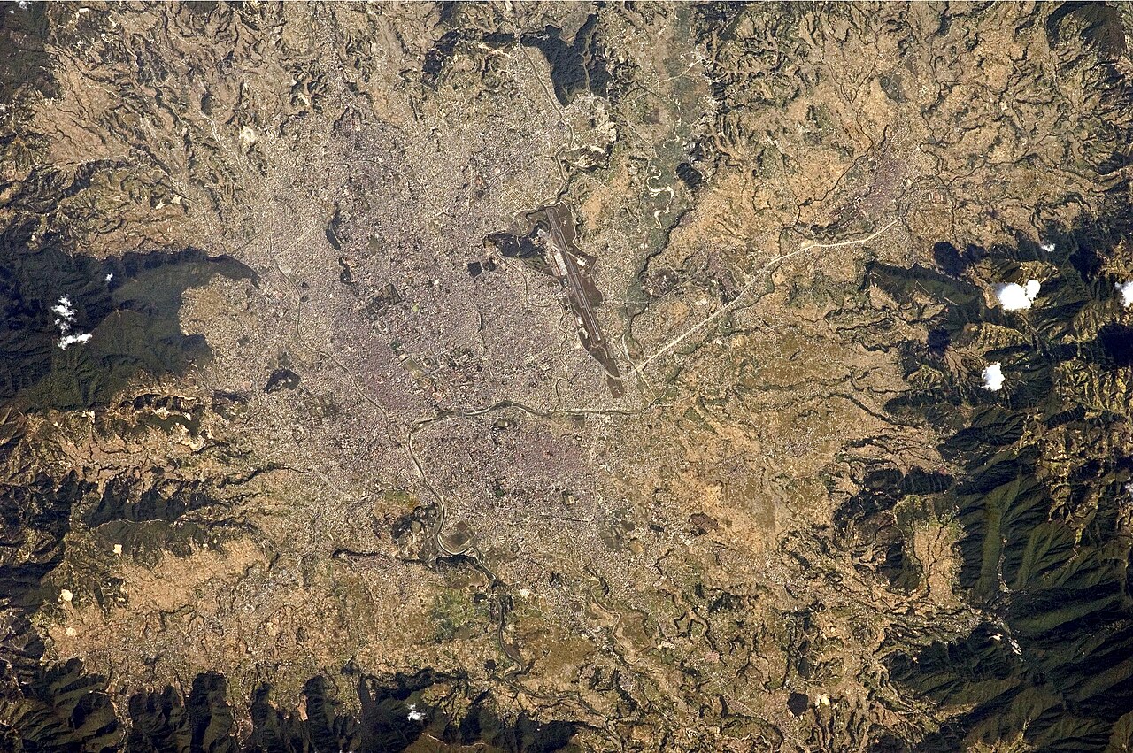 Aerial view of Kathmandu city from the International Space Station showing the Bagmati River and surrounding mountains, Nepal