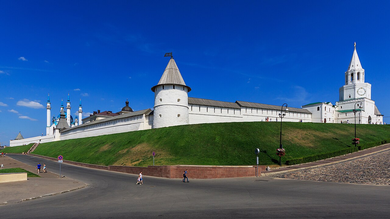 Kazan Kremlin white walls and Kul Sharif Mosque minarets against clear sky