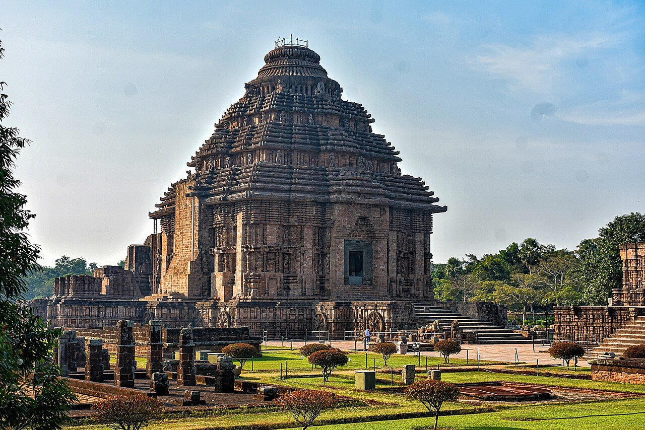 The Konark Sun Temple, Odisha, showing the surviving jagamohana audience hall and elaborately carved stone base with wheel carvings