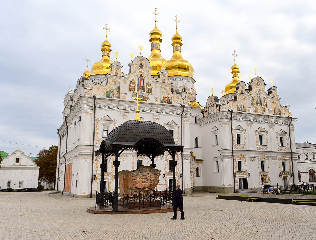 Golden domes and green cupolas of Kyiv-Pechersk Lavra monastery above the Dnipro riverbank