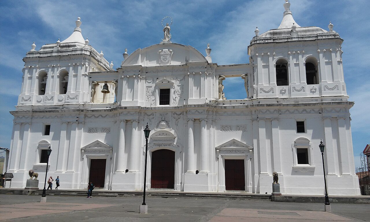 Cathedral of the Assumption of León wide pale stone facade overlooking central plaza, Nicaragua