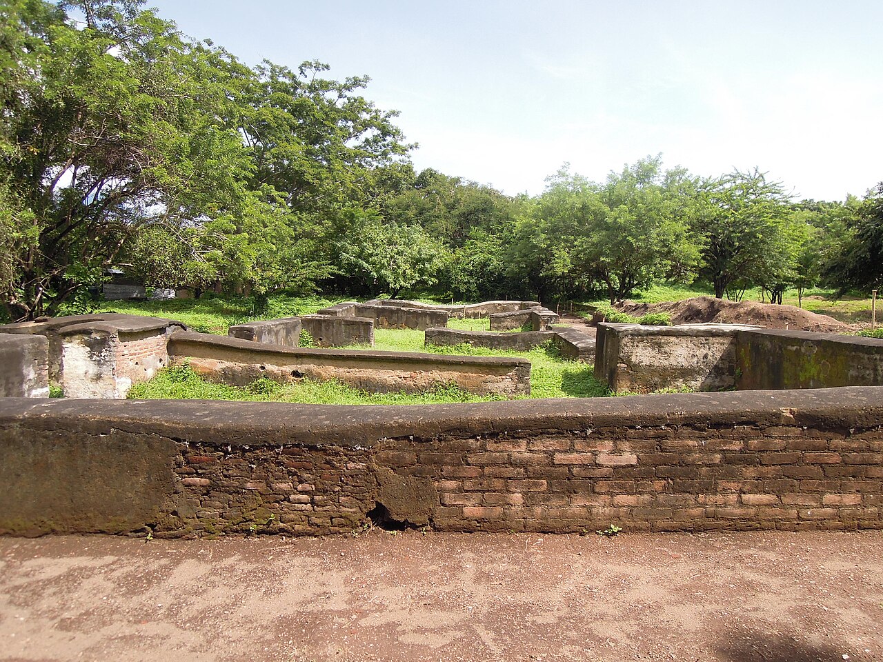 Excavated stone foundations of León Viejo colonial ruins near Momotombo volcano, Nicaragua
