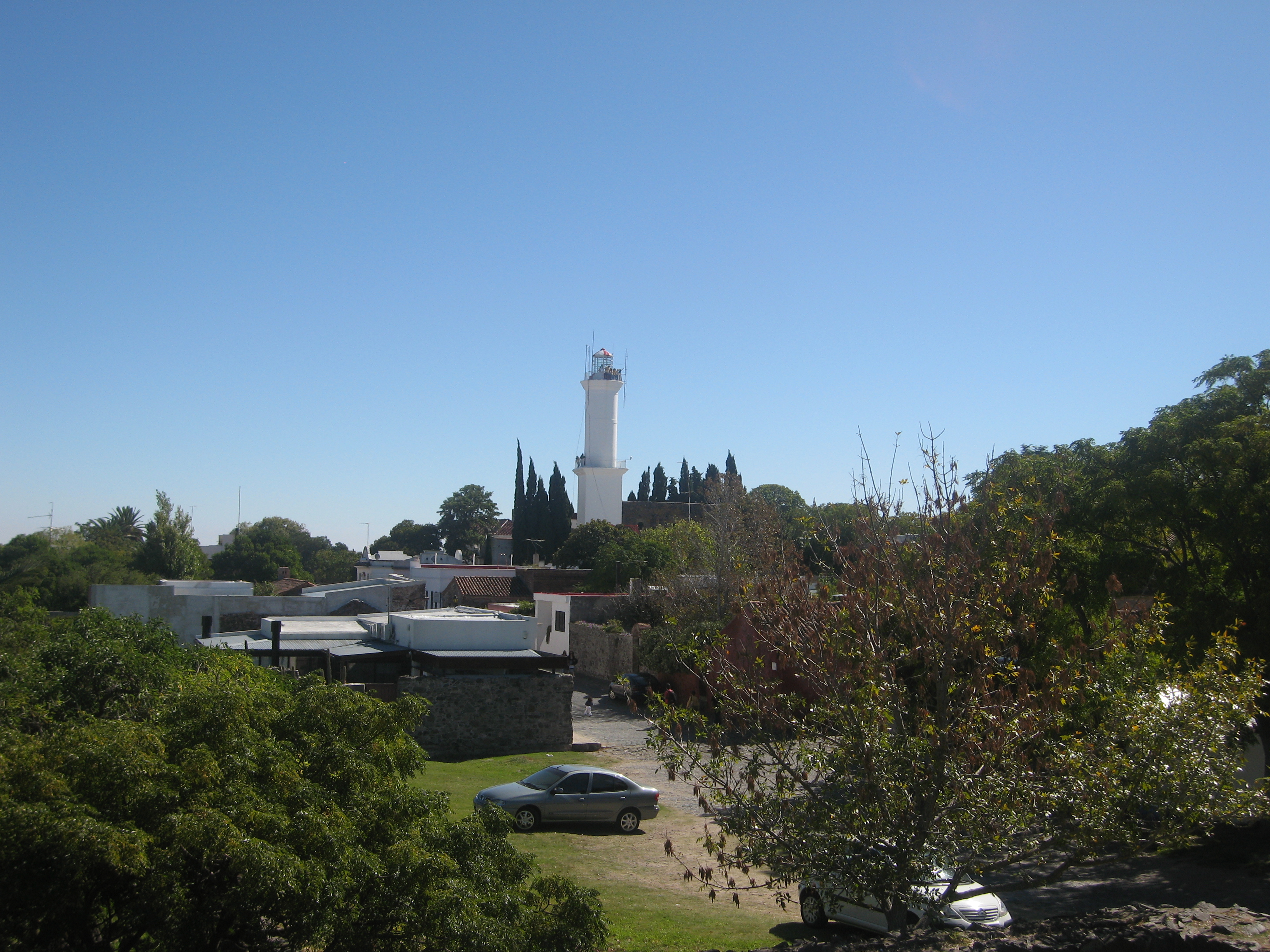 Colonial lighthouse rising above the fortification walls at Colonia del Sacramento Uruguay