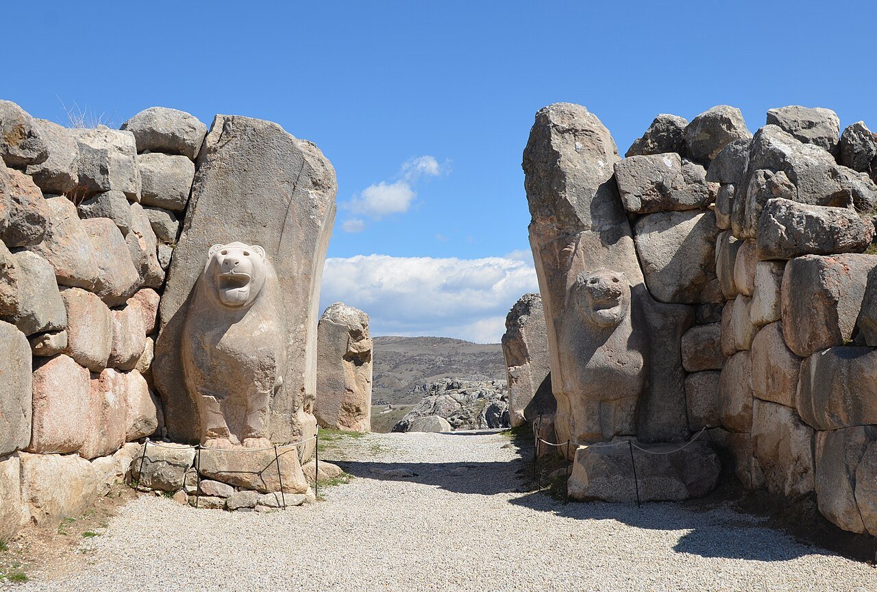 Two stone lion sculptures flanking the ancient entrance gate at Hattusa Turkey