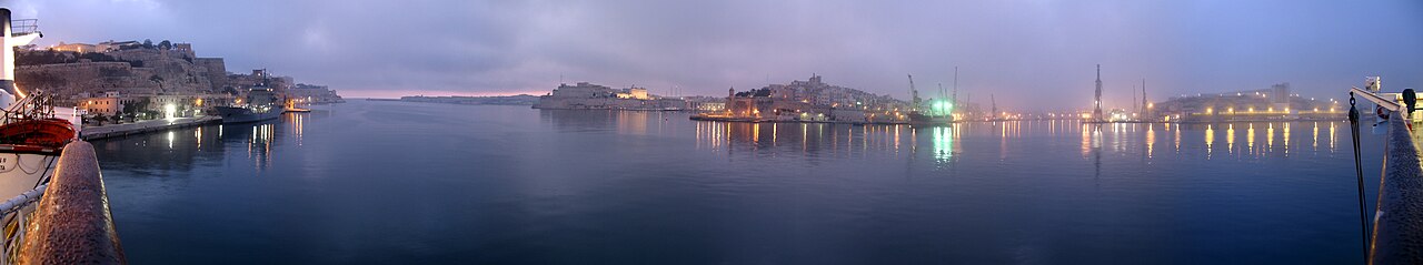 Grand Harbour Valletta skyline and Three Cities at blue hour Malta