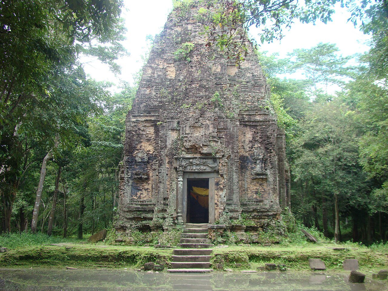 Brick temple tower surrounded by tropical forest at Sambor Prei Kuk Cambodia