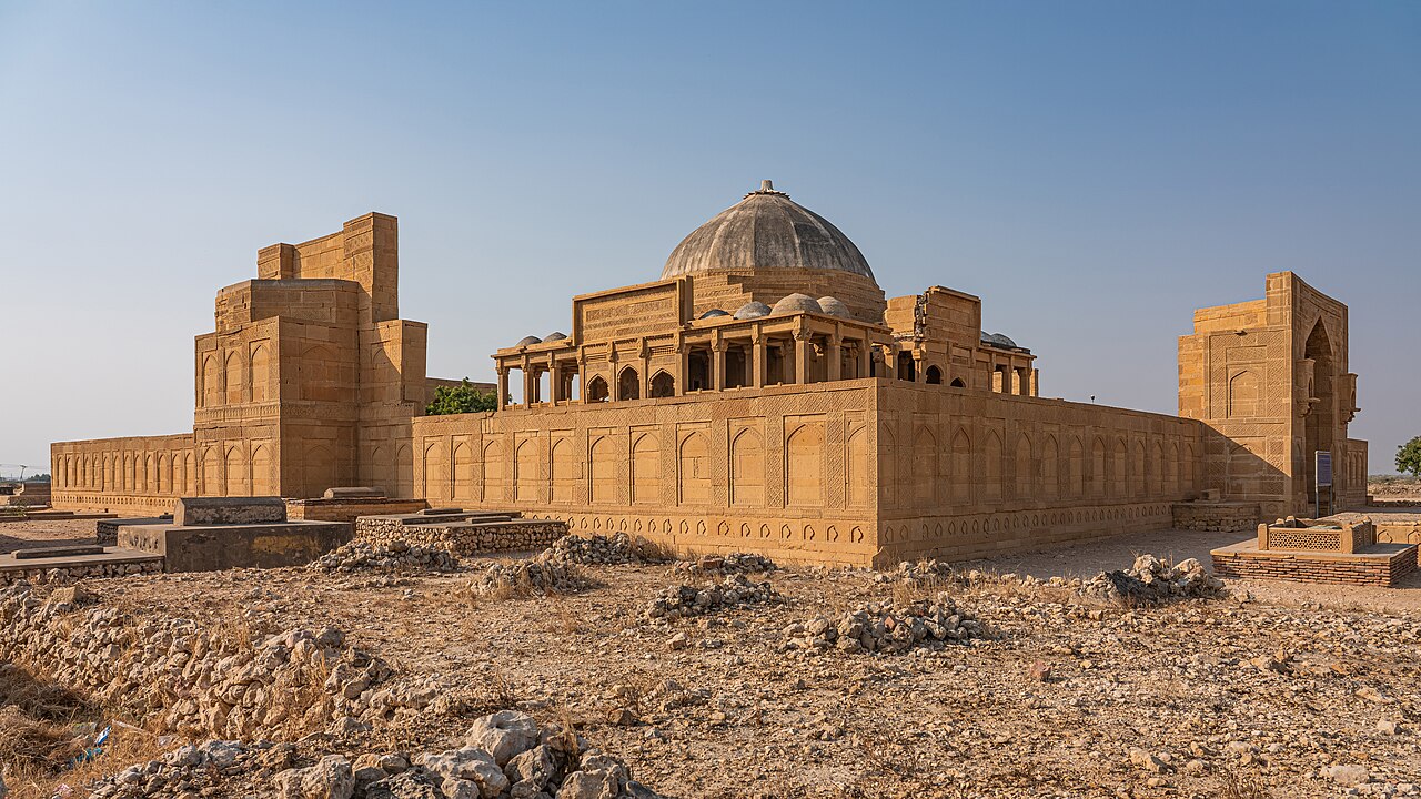 Carved stone tombs and mausoleums stretching across Makli Hill necropolis, Thatta