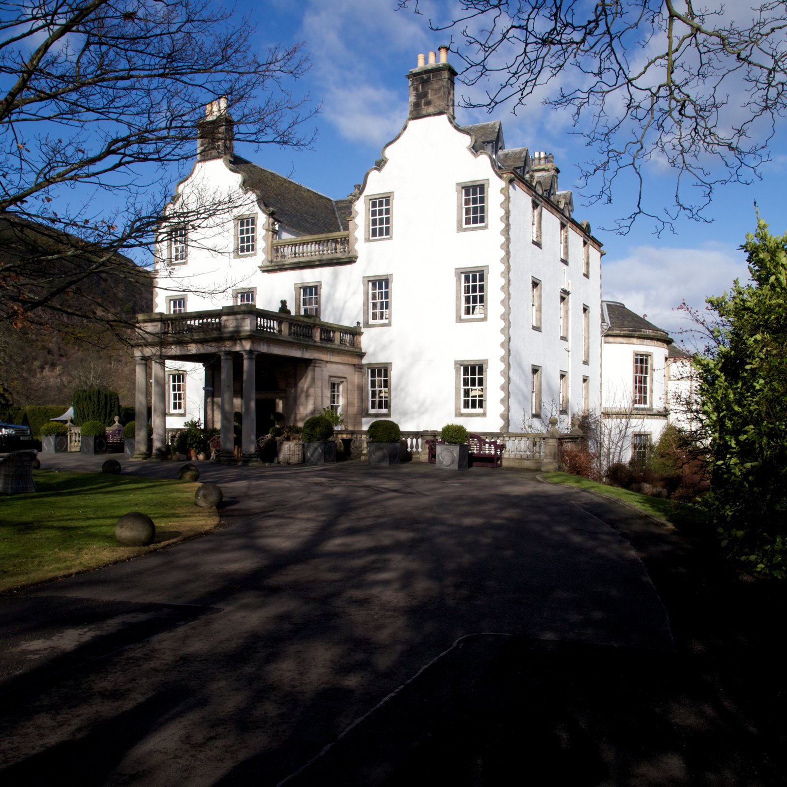 Prestonfield House seen from the south-west, white harled walls and crow-stepped gables