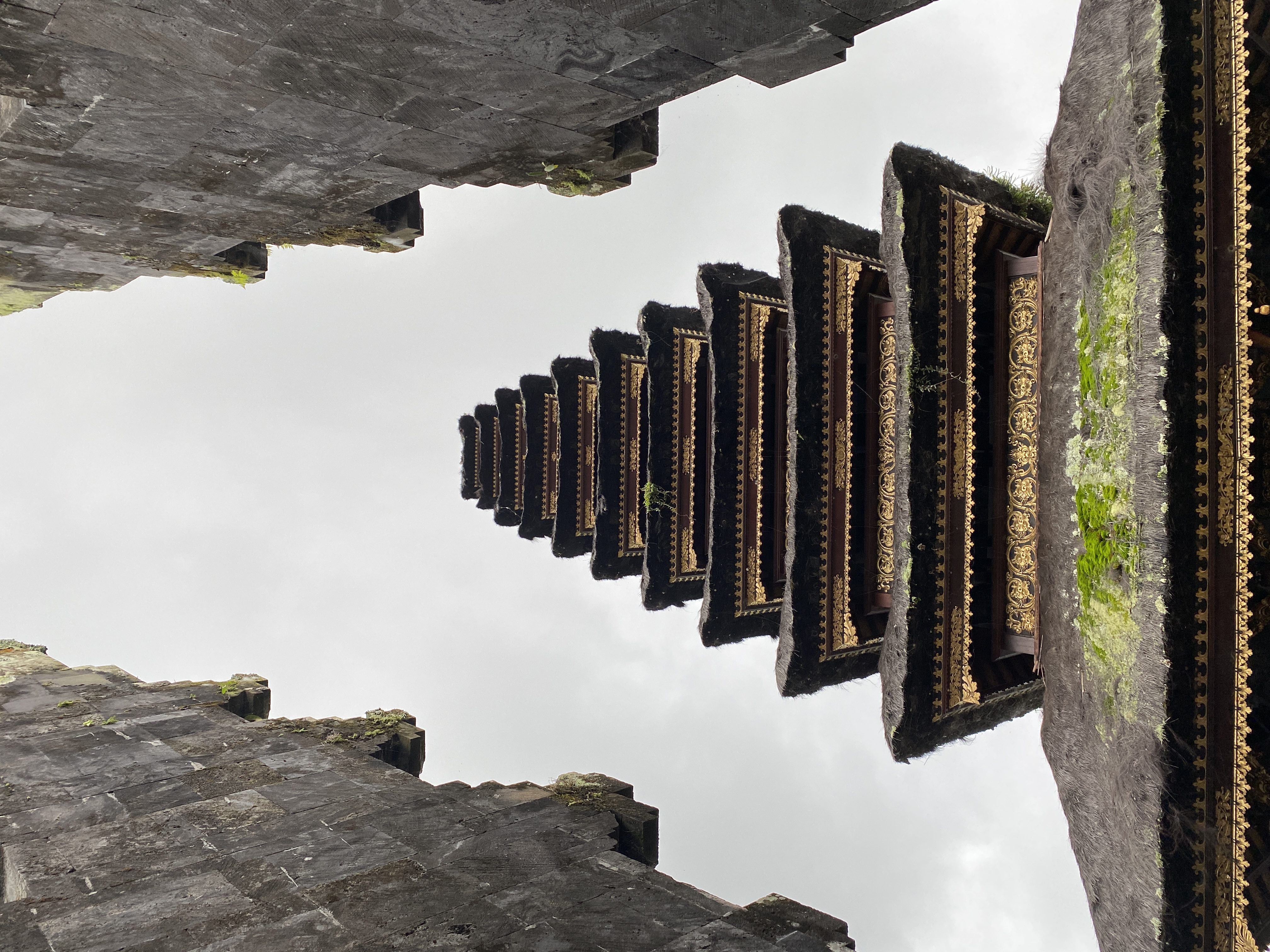 Stone shrines and pavilions of Pura Ulun Danu Batur overlooking the volcanic caldera