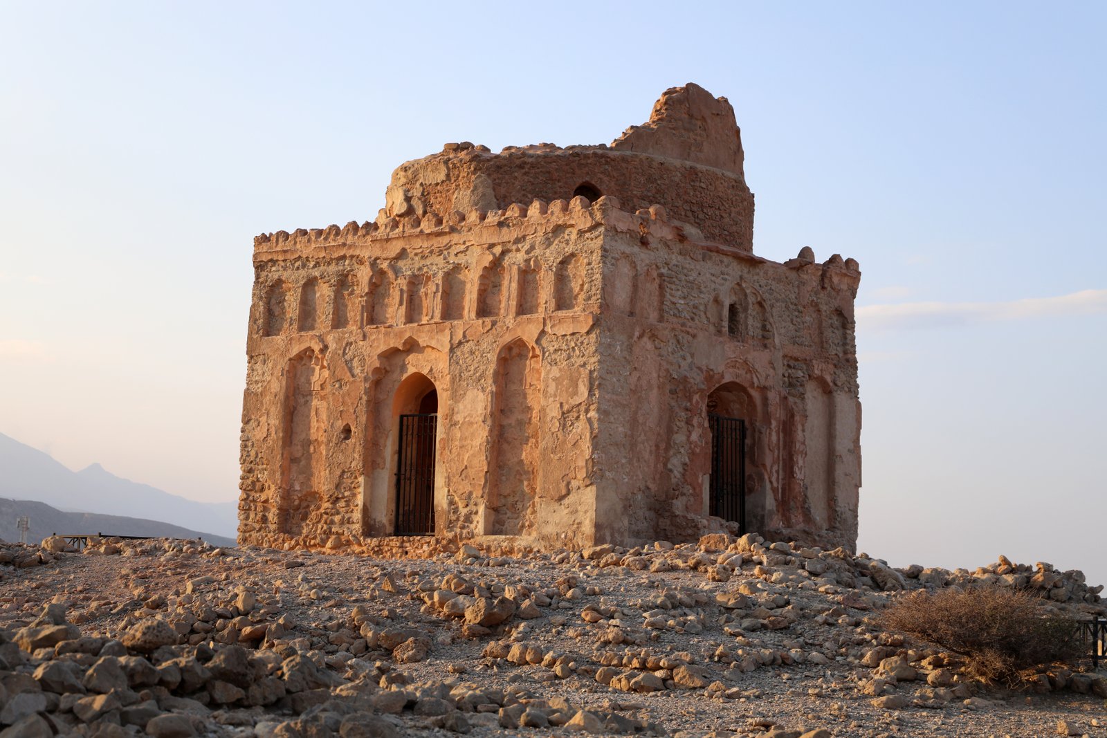 Mausoleum of Bibi Miriam at Qalhat showing ornate facade and arched entrance, Oman