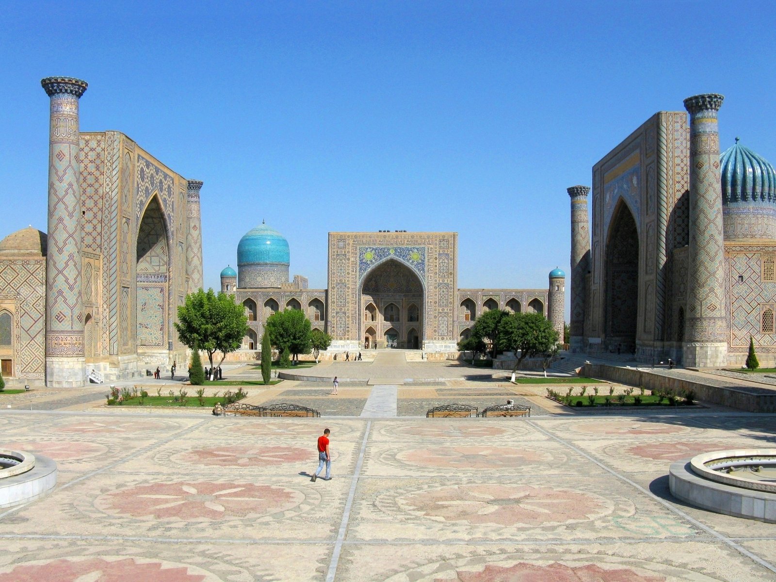 Three grand Timurid madrasahs facing each other across Registan square in Samarkand