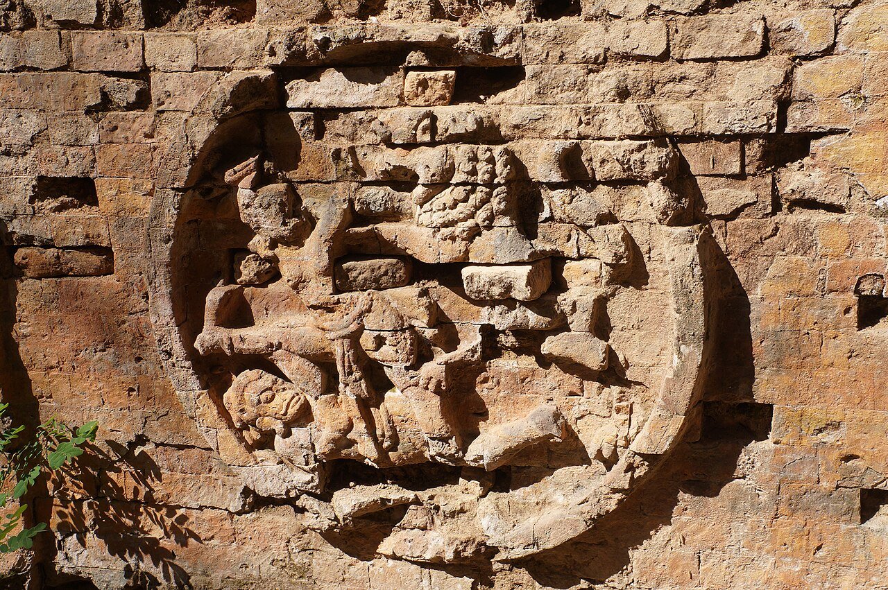 Ancient carved bas-relief at Sambor Prei Kuk temple complex in Cambodia jungle