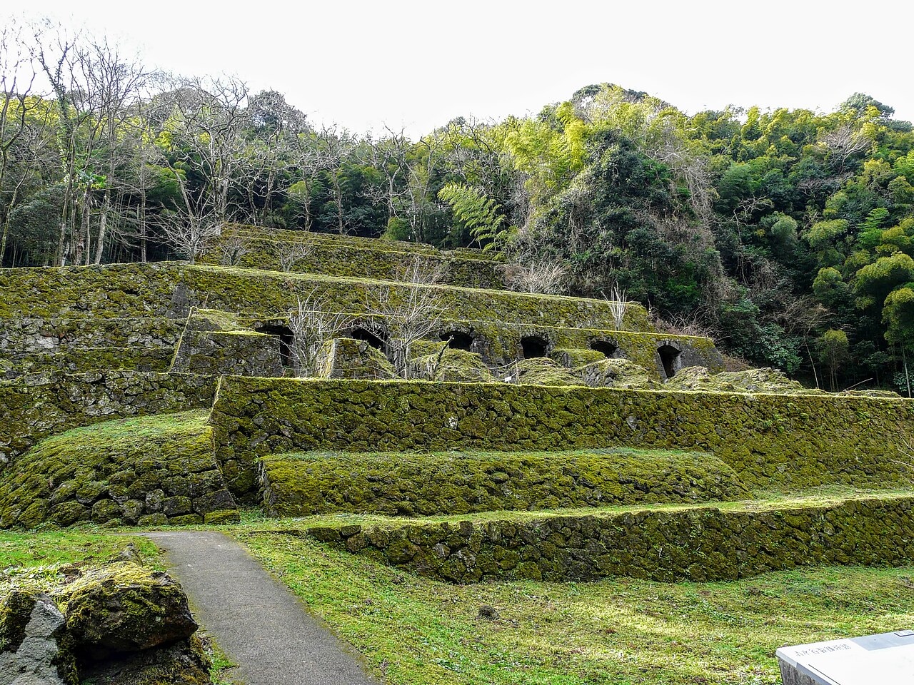 Shimizudani refinery ruins overgrown with moss and forest vegetation at Iwami Ginzan Silver Mine, Shimane Prefecture
