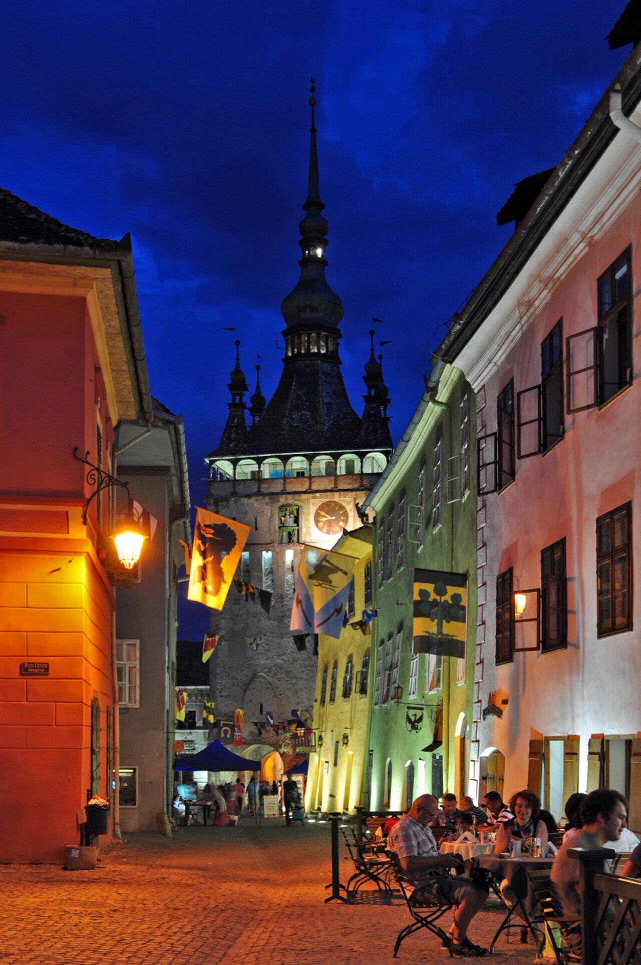 Strada Turnului in Sighișoara's medieval citadel, with cobblestones and the Clock Tower visible